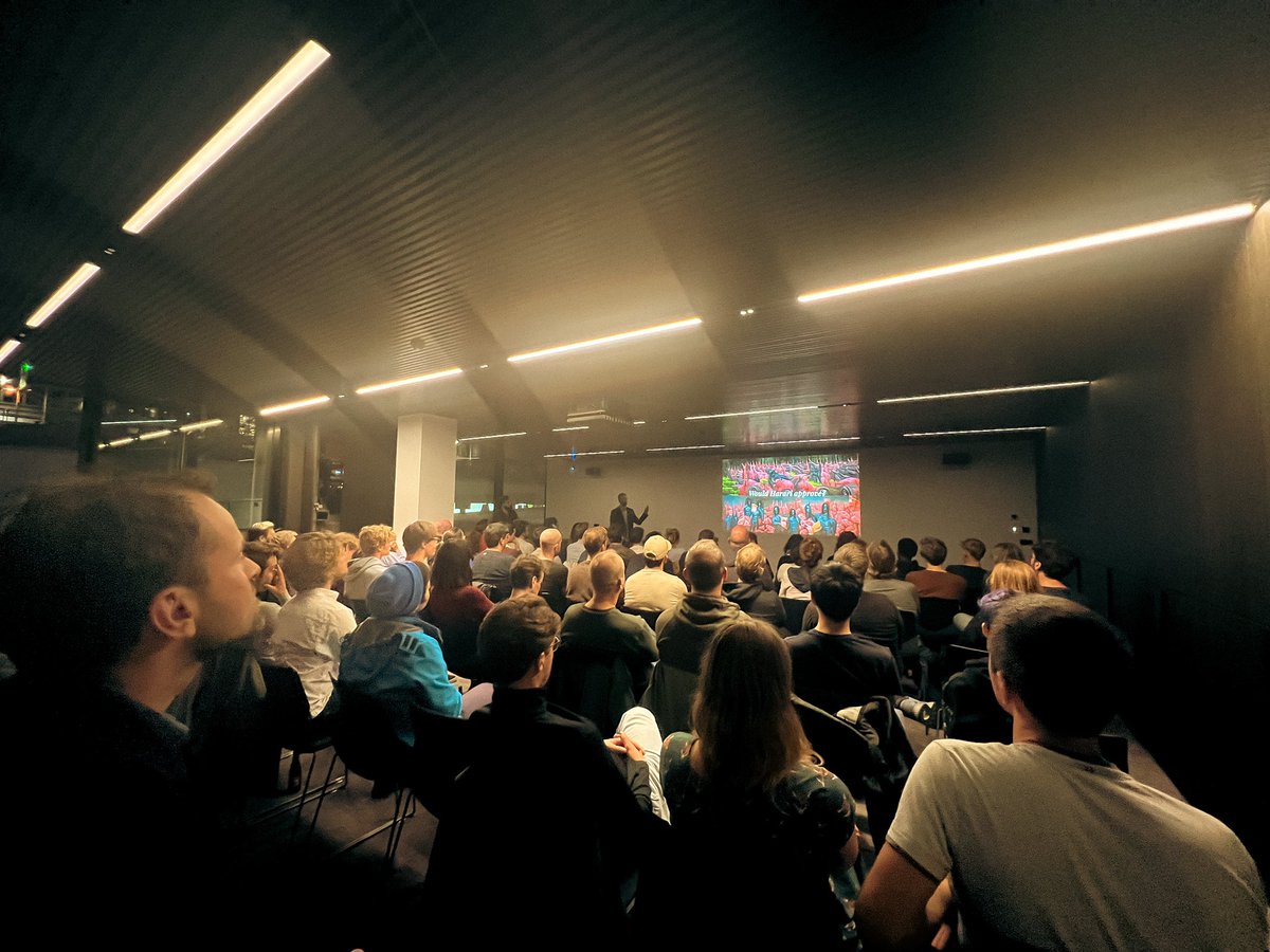 Full house <a href="/uxghent/">UX Ghent</a> about Generative/AI art. Very happy to see a room full of UX designers and ML engineers! I, for one, welcome our new AI overlords.