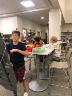 CalvertSS's tweet image. Ms. Reid’s students at WHMS preparing to be great presenters while workshopping with their teacher, Ms. Reed, RISE specialist Ms. Curtin, and media specialist Ms. Jones. PBL rocks!