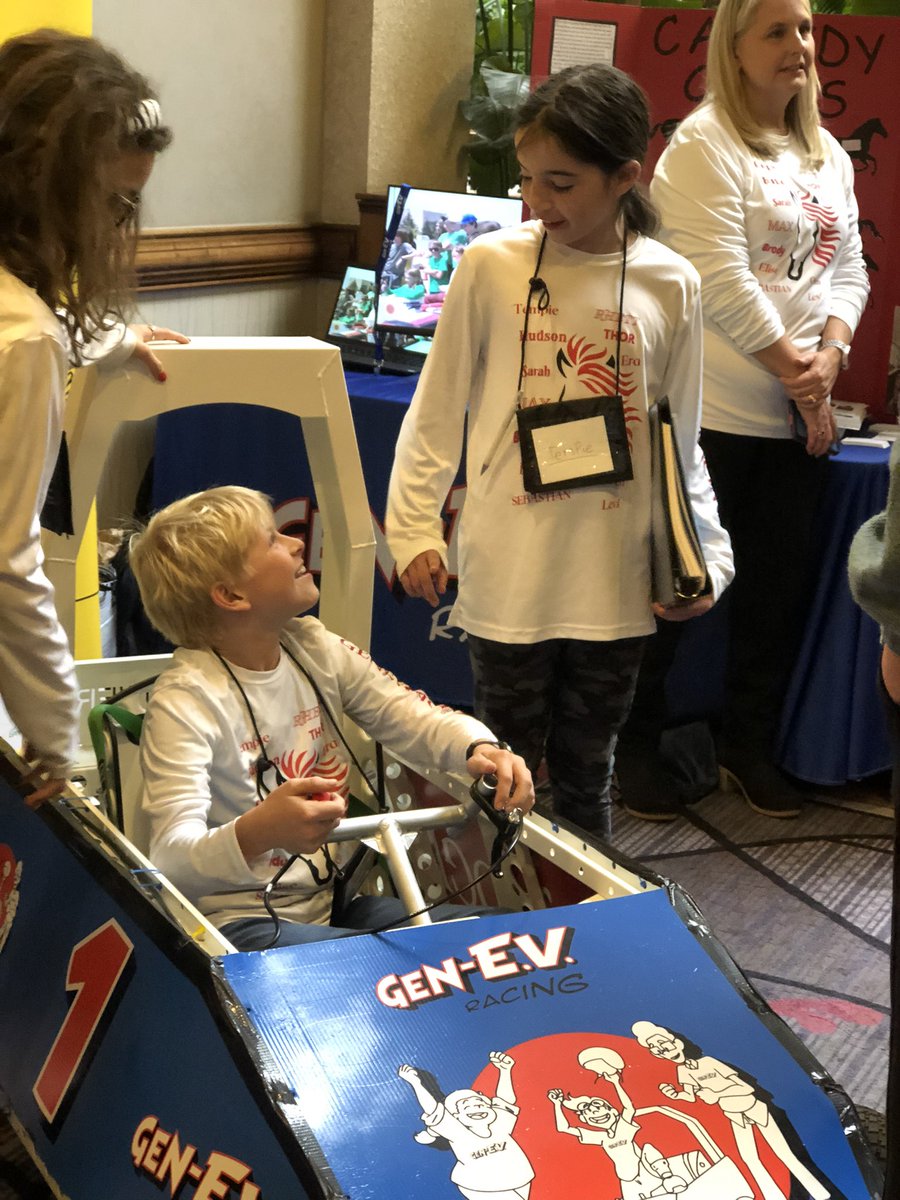 KentuckyEEC's tweet photo. GenEV students show off the electric vehicles built by local students to guests at #eec22 https://t.co/1eRDkHq3fc