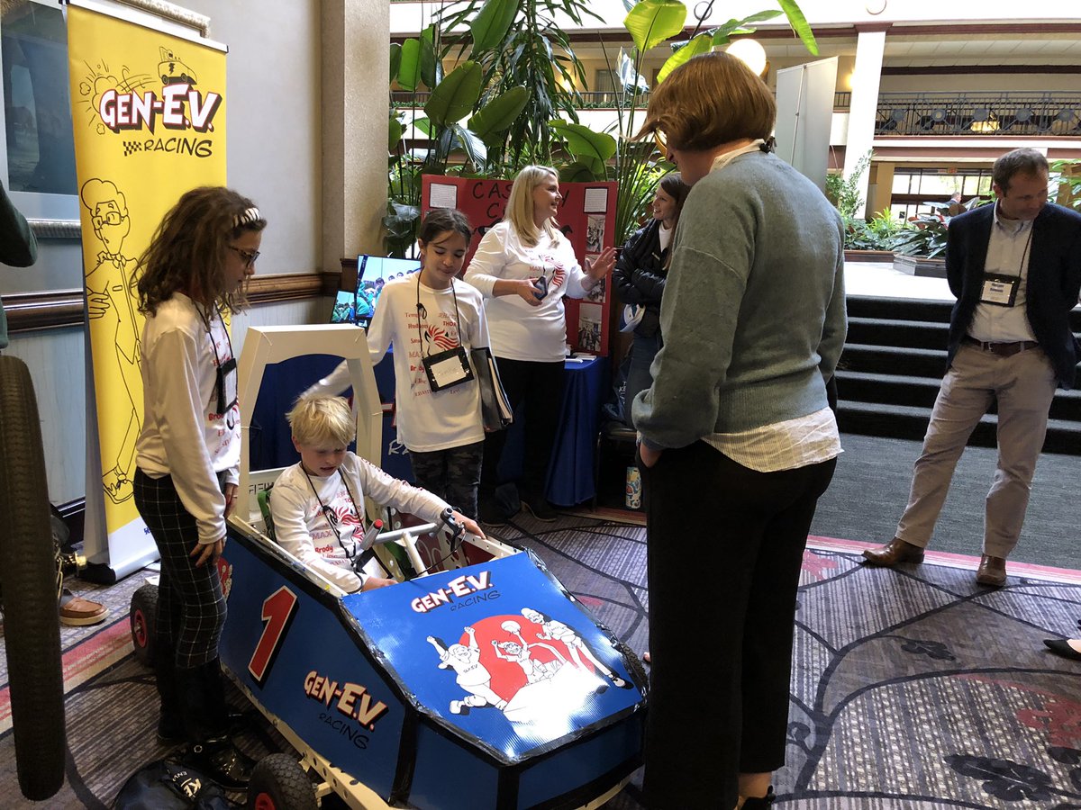 KentuckyEEC's tweet photo. GenEV students show off the electric vehicles built by local students to guests at #eec22 https://t.co/1eRDkHq3fc
