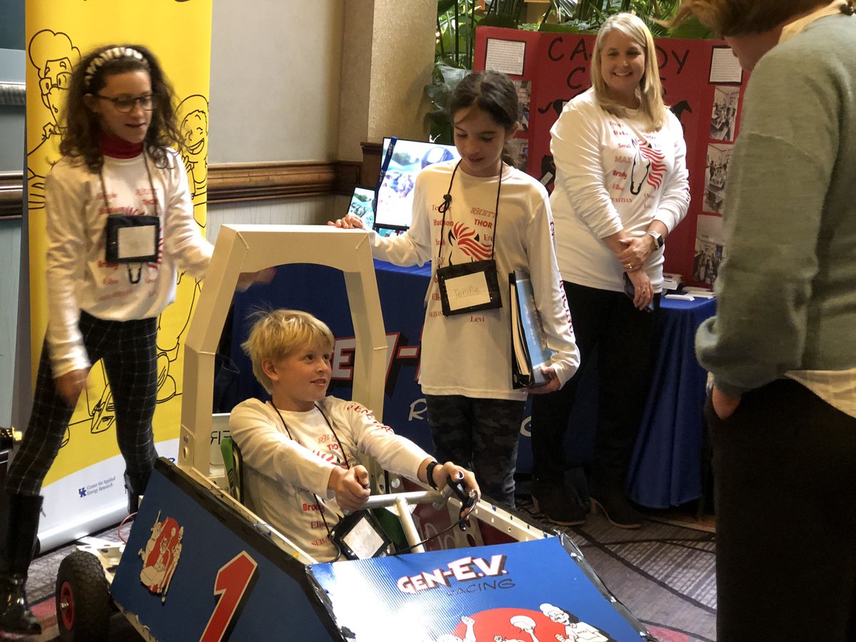 KentuckyEEC's tweet photo. GenEV students show off the electric vehicles built by local students to guests at #eec22 https://t.co/1eRDkHq3fc