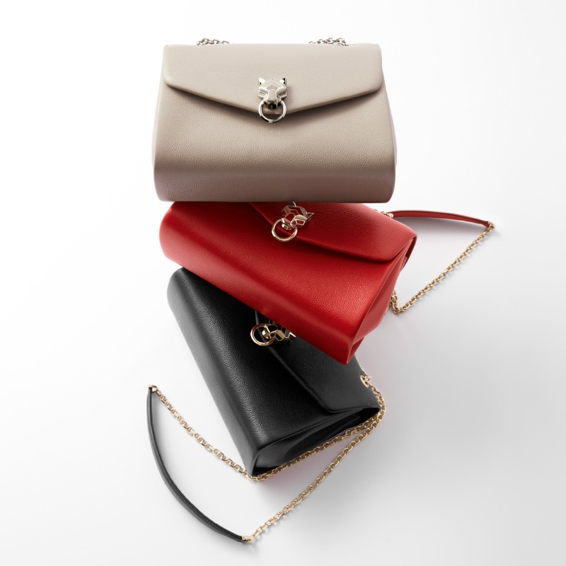 Cartier's tweet photo. Complex, alluring, utterly magnetic. The spirit of the new Panthère de Cartier bag is embodied by the inimitable Lily Collins. #PanthèredeCartier