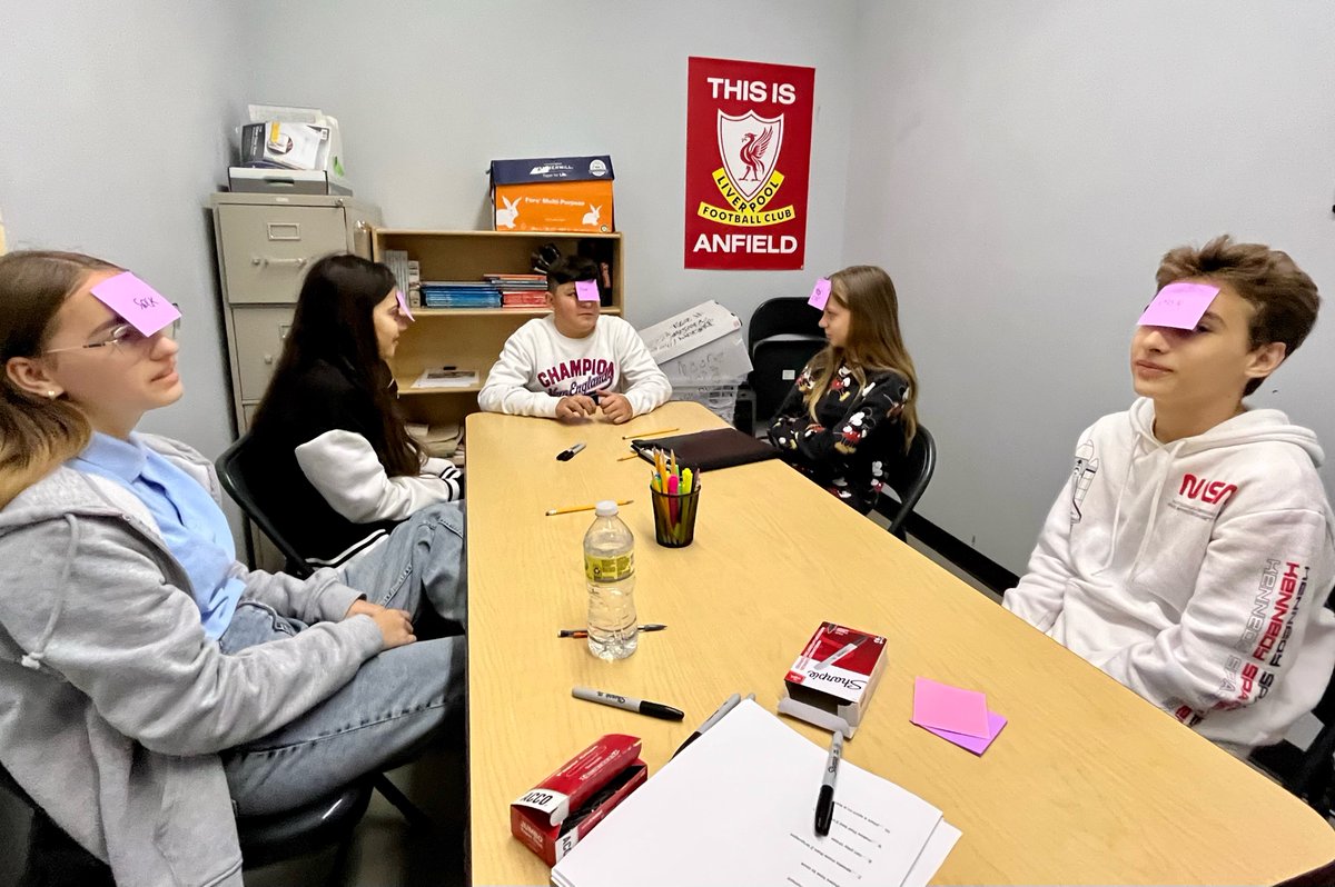Ukrainian students play a game to practice the interrogative form in English. On their head, they have the name of a famous person, animal or thing &amp; ask their partners questions to guess it-- they can only answer yes or no. What a fun and engaging way to learn the language!