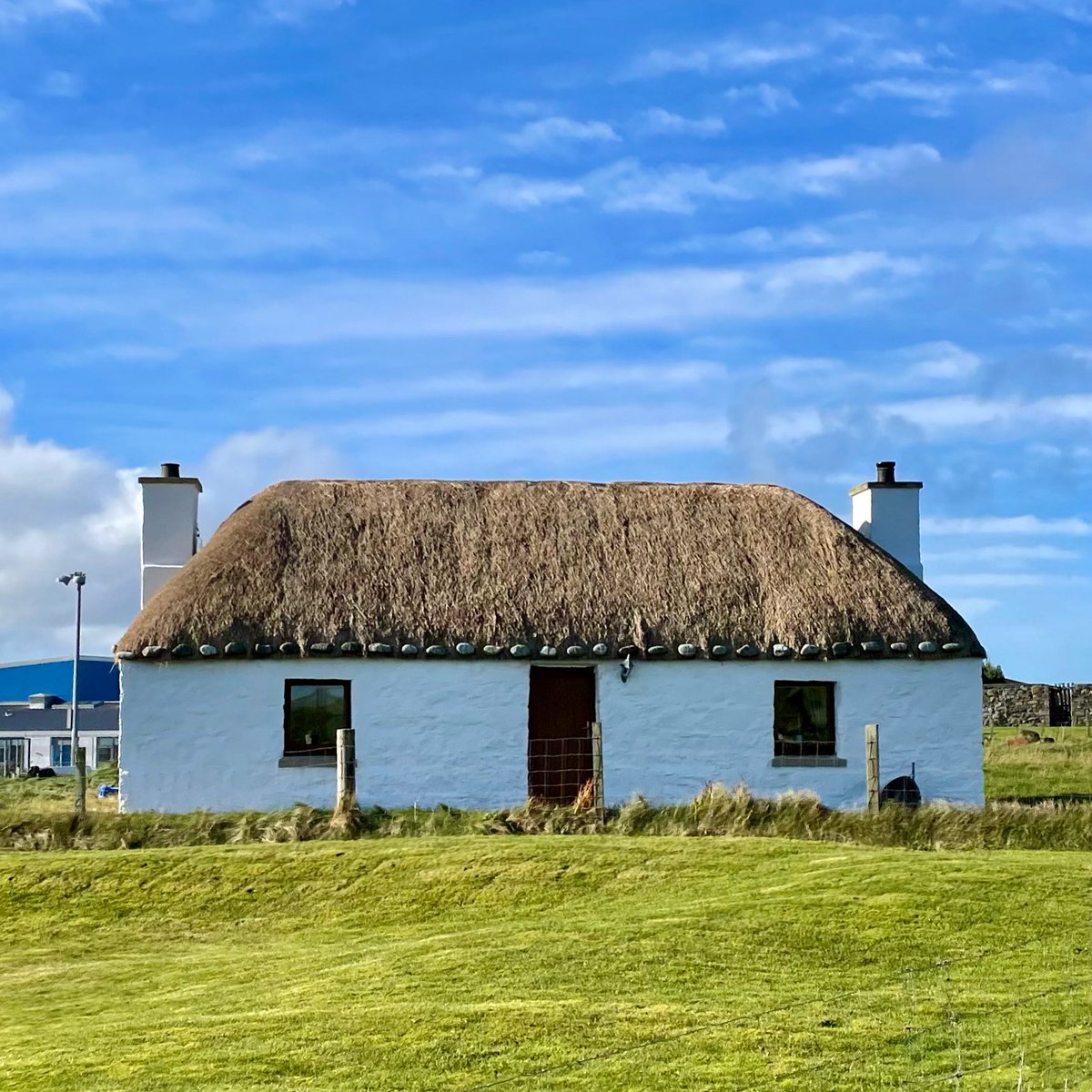 The cottage at Balivanich looking handsome with its new marram grass thatched roof #ThatchedCottage #TraditionalSkills