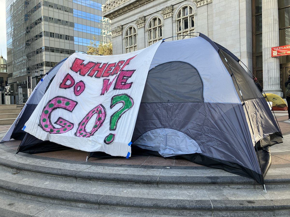 Unhoused residents displaced from Wood Street have pitched their tents in protest in front of Oakland City Hall, calling attention to their lack of options for shelter, and to press the council to pursue steps to open the old army base site. #oakmtg