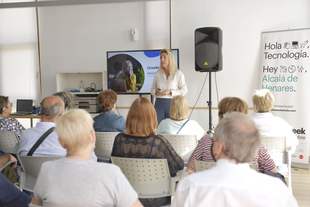 caixabank's tweet photo. En el marco de la @mWeek_Alcala hemos organizado una charla sobre digitalización para mayores de 65. La directora del segmento sénior, Nuria Asensio, ha ofrecido una sesión de formación en el uso de aplicaciones de uso común en su día a día y en seguridad digital.#mWeekAlcala22 https://t.co/zqAoYqmxoA