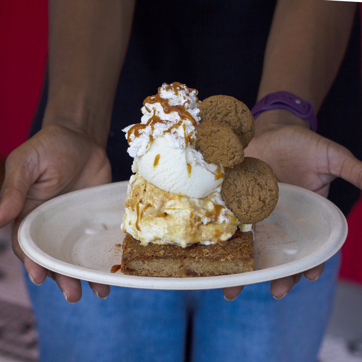 The Pumpkin King will see you now. This monstrous sundae is two spooky scoops of Just Vanilla, Please. on a warm slice of pumpkin ooey gooey butter cake 🎃 haunted by whipped cream,  gingersnaps, caramel drizzles and a pinch of pumpkin pie spice. 🥄 Available at all scoop shops!