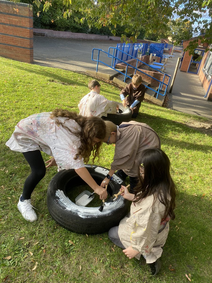 NormantonCommon's tweet photo. Well done, Environment club! They worked so hard to prepare the tyres ready for coloured paint after the holidays. Just look at the amazing area they are transforming #activecitizens #activecommunicators #activelearners ☀️ https://t.co/a5ph0VWzIV