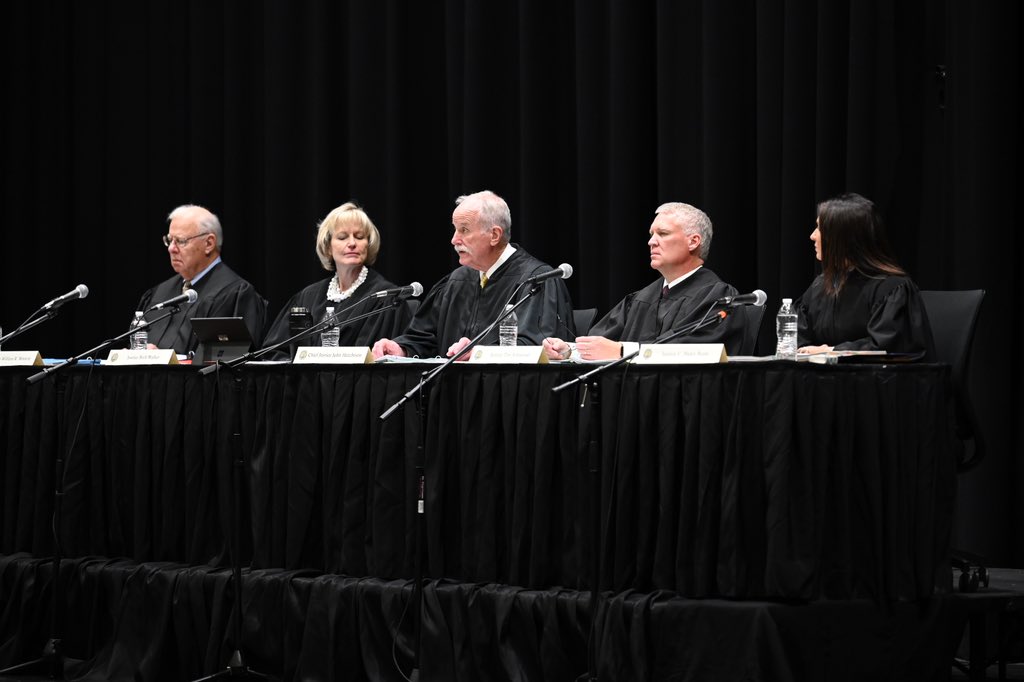 WVcourts's tweet photo. The Supreme Court heard arguments remotely today, Oct. 18, 2022, at Woodrow Wilson High School in Beckley, WV.  The arguments are part of the LAWS program, which exposes students to actual Supreme Court cases at a venue in their local community. https://t.co/qzTyeN3vc8