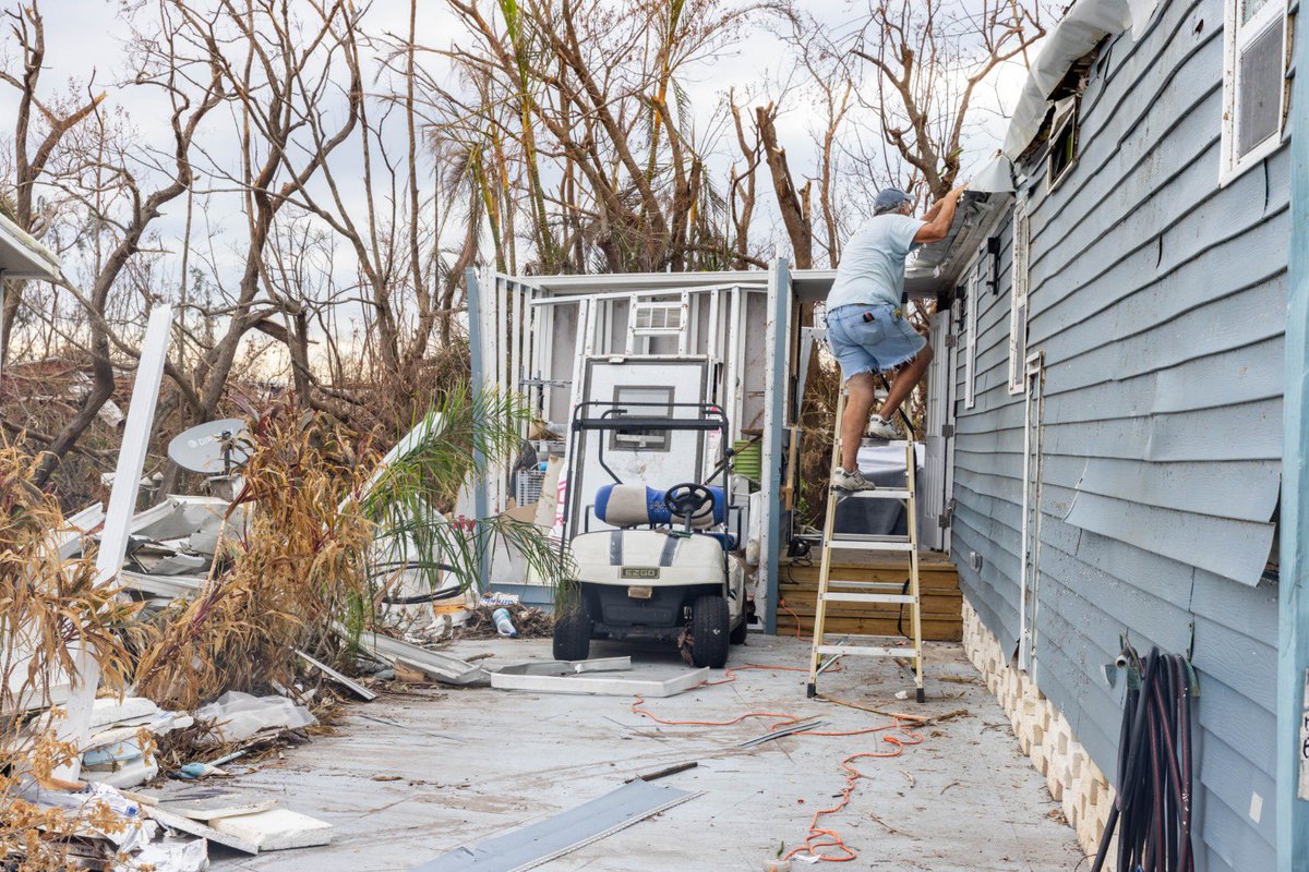 “Since I'm the young one, I'm tarping up homes, trying to dry them out—although it's pretty tough since every home has had 23 or so inches inside… This food means a whole lot, I haven't eaten yet today—and the heat gets to you. Oranges keep your sugar up!' Wally Pine Island, FL