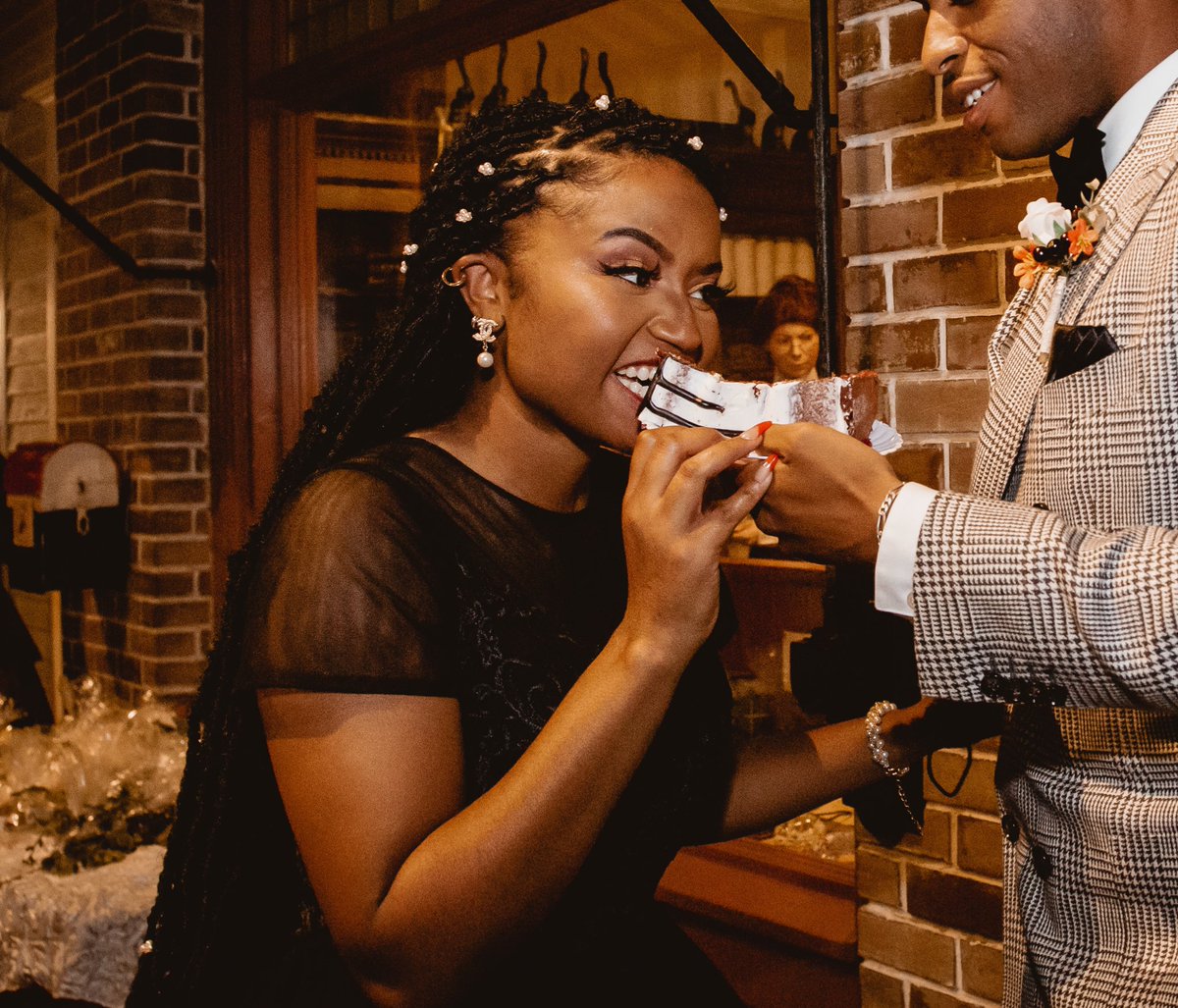 ArtLaish's tweet photo. This wedding photo is so funny because I practice my elegant face for weeks only to look like a gremlin. This is how I chose to eat the cake…… https://t.co/NBxG1QIrWu
