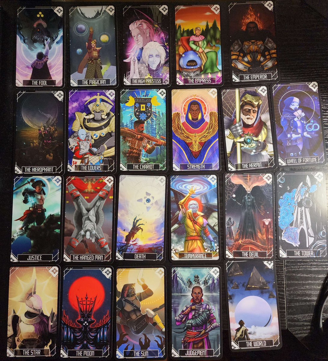 Destiny2Tarot's tweet photo. Some of our artists have begun ordering decks for themselves and we’ve got photos to share! Courtesy of @livfreeart , here’s what a full deck looks like 💫✨ https://t.co/dXpXAeiAAy