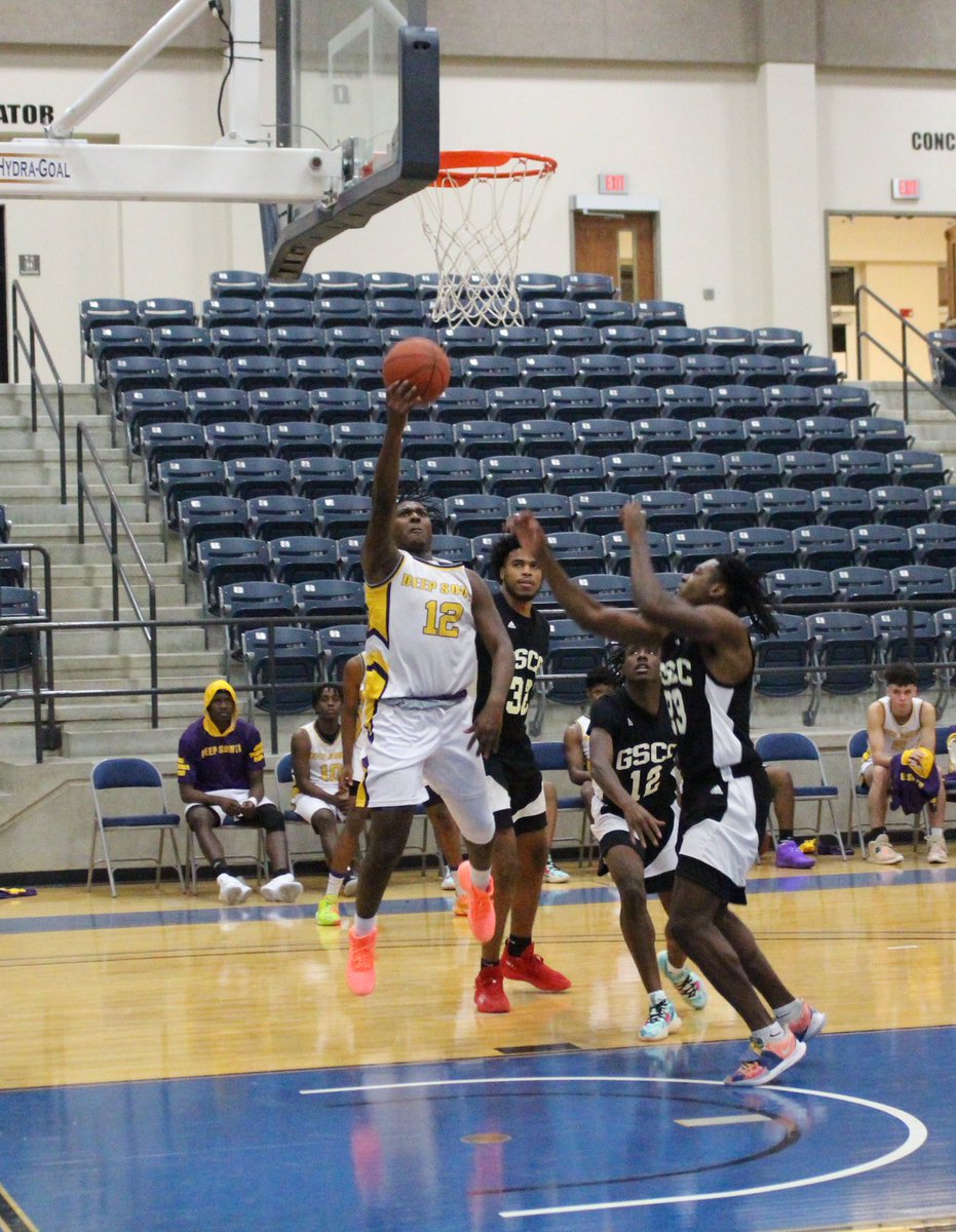 6’1 PG/2G Richard Casler goes strong to the basket.