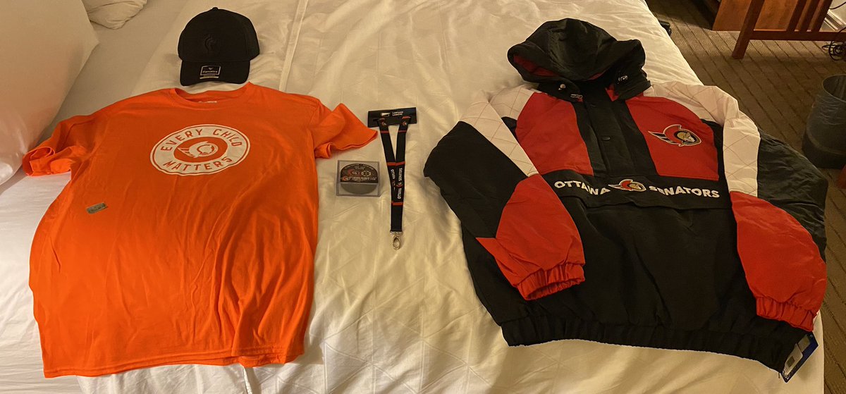 Alm0stYell0w's tweet photo. Here is our haul after the game. Was gonna pull the trigger on a DeBrincat jersey but they were over $300?!? Still happy with the items we got as well as the win!! #GoSensGo #Sens #SensInSession https://t.co/NS2wW8owP0