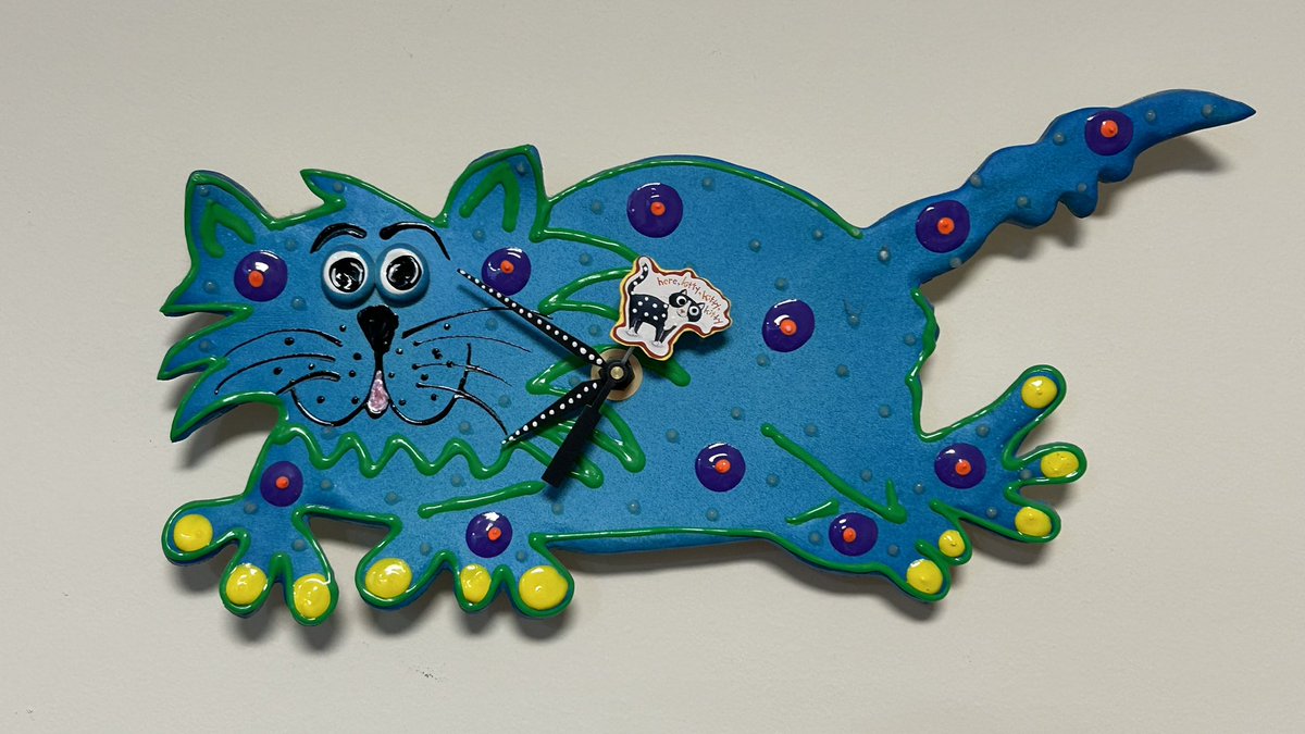 janetcotner's tweet photo. Brainstorming what to post for #NerdfArters Day 18 #KittyTime when I look up at my wall and see this clock. A gift from my aunt over 15? years ago, made by a local artist, Pond Scum Ceramics. (Can’t find a Twitter handle to credit.) My favorite clock in the house! https://t.co/bLIok95j2h