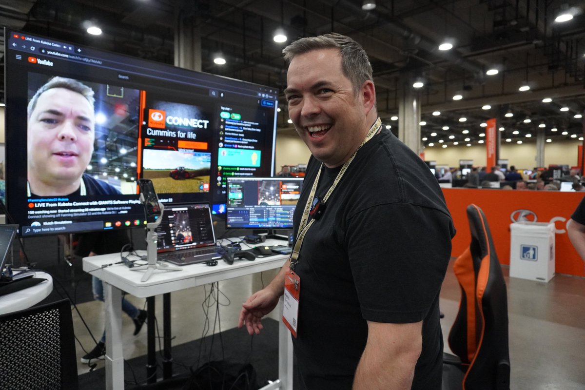 farmingsim's tweet photo. It was a successful first day at Kubota Connect. @GIANTSSoftware Partner @KlutchSim got to teach the crowd how to play Farming Simulator 22 and streamed live from the event on his YouTube channel as well. Join him and Kermit again on Wednesday from 8am-5pm CDT (3pm-12am CEST) https://t.co/nOXXVTX6b5