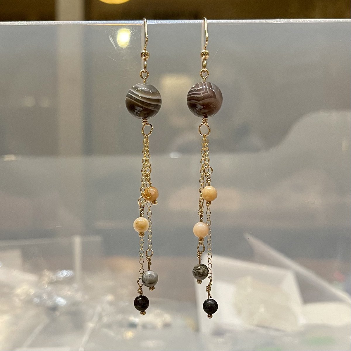 elakdawalla's tweet photo. Lookit the Jupiter + moons earrings I just made #EmilysSpaceCraft https://t.co/6rZ4d6ant9
