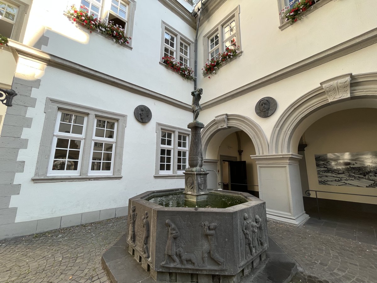 hhofgermany's tweet photo. Schängelbrunnen fountain is a symbol of #Koblenz and stands on Willi-Hörter-Platz, encircled by renaissance and baroque buildings. It is dedicated to the Koblenz-born poet, Josef Cornelius, who wrote the lyrics to the well-known Schängellied song, the city anthem. #WeAreGermany https://t.co/qNLate42X6