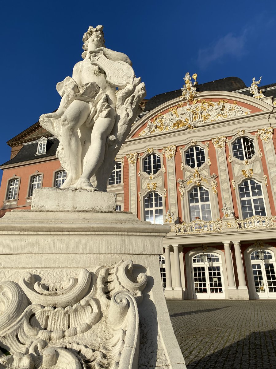 hhofgermany's tweet photo. Electoral Palace in #Trier is one of the world's most beautiful examples of a Rococo palace. Today, the Grand Chamber in the Rococo south wing hosts classical music concerts. The palace gardens are open to the public and feature a large pond and beautiful statues. #WeAreGermany https://t.co/caBnjjr0TQ