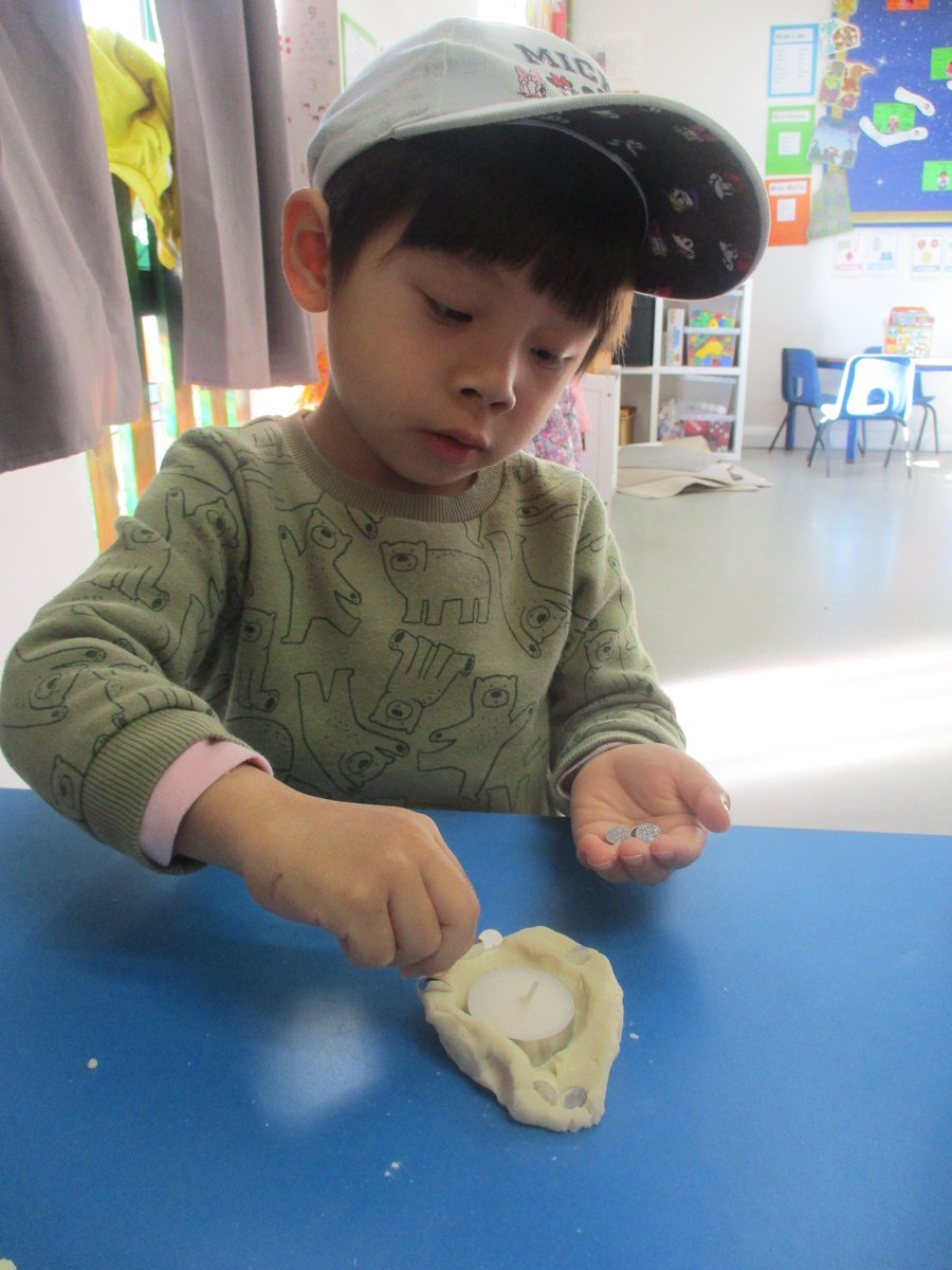 GreenacresLtd's tweet photo. On Monday we looked at the celebration of #Diwali. We made salt dough to shape & create #DivaLamps. We then added a candle & lots of glittery sequins. Later we also created patterns on our hands to understand #MehndiPatterns and used our little shapes to create #RangoliPatterns https://t.co/KGtYg5B3Kc