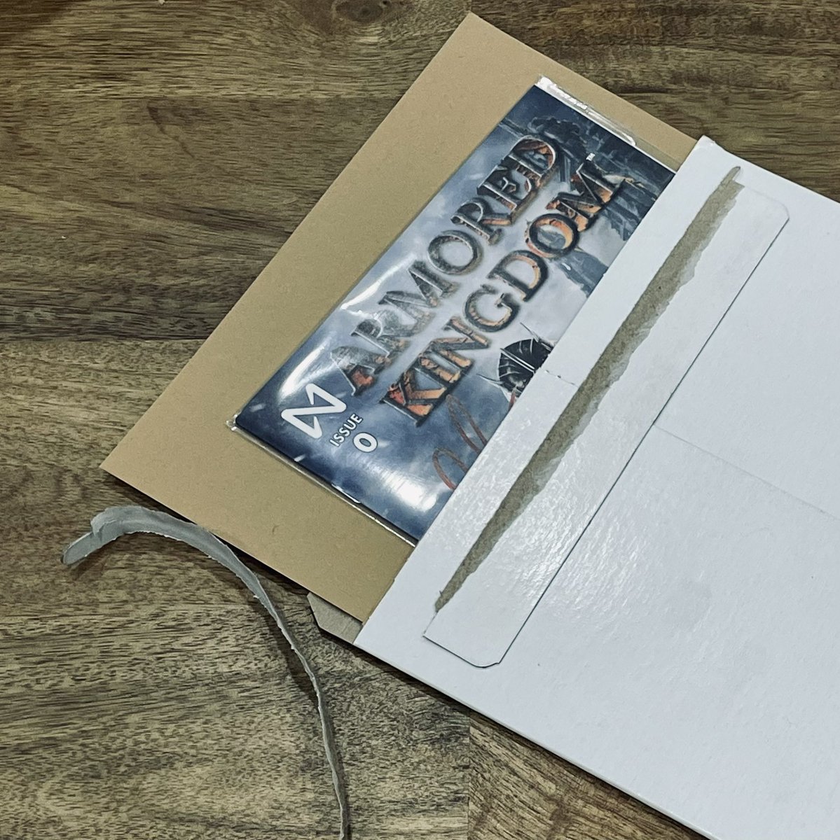 pArtySHIP1202's tweet photo. Last night I came home from work to find a #LEGENDARY package in the mail. This was a 1-of-50 print of the #Issue0 limited #ArmoriteEdition of the @ArmoredKingdom comic, signed by the project creators. Thank you for supporting community creativity ๐โค๏ธ๐ #WAGMI https://t.co/Gd3EISotnM