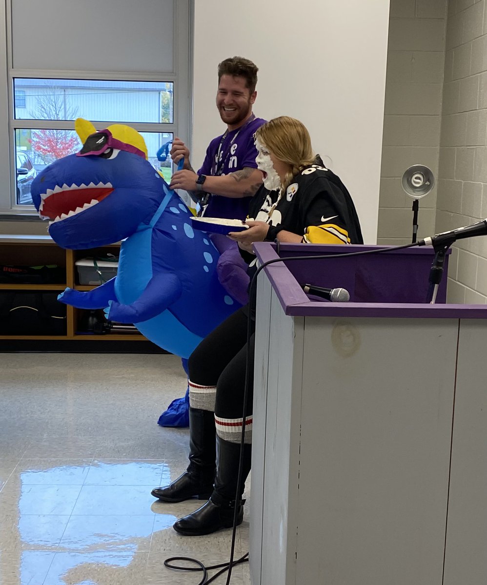 jendeib's tweet photo. @WESpolarbears announced their Polar Bear Run winners today on WE-TV. Mr. Locke celebrated in a dinosaur costume…and pieing Mrs. V! 
#becomebelongbenorthern https://t.co/iXV30PQ0Nr