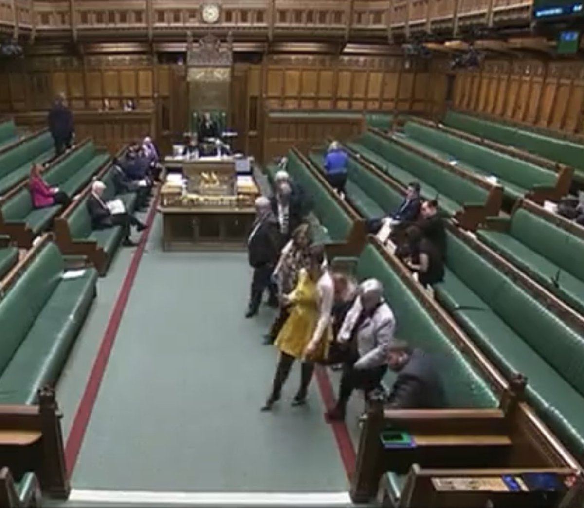 ferryhill9's tweet photo. For all the SNP supporters continuing to complain about Alba, below are two photos, the first when the Deputy Speaker calls on Kenny MacAskill to speak, the second is 2 seconds later when everyone from the SNP front bench in an orchestrated move get up and walk out. Shameful. https://t.co/r8oJHY1apX