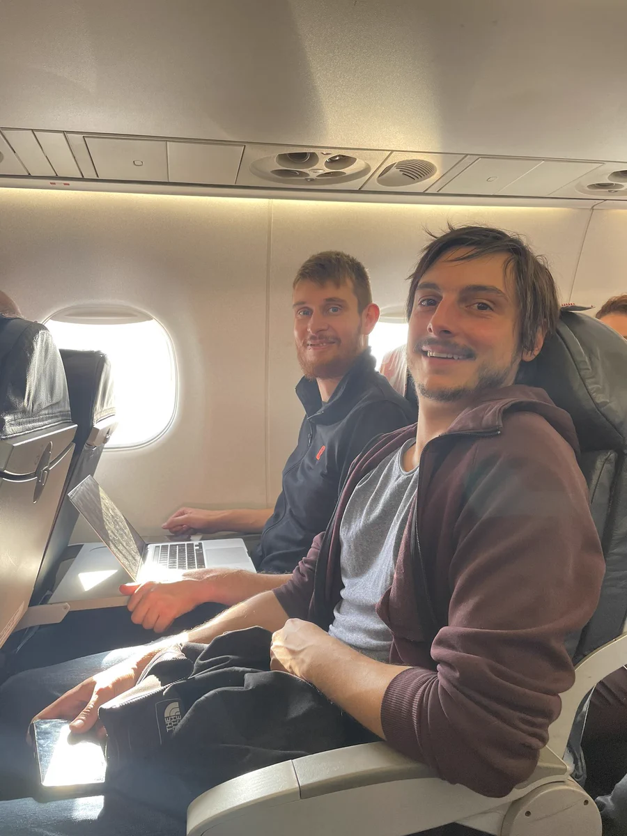 Picture of two people on a plane