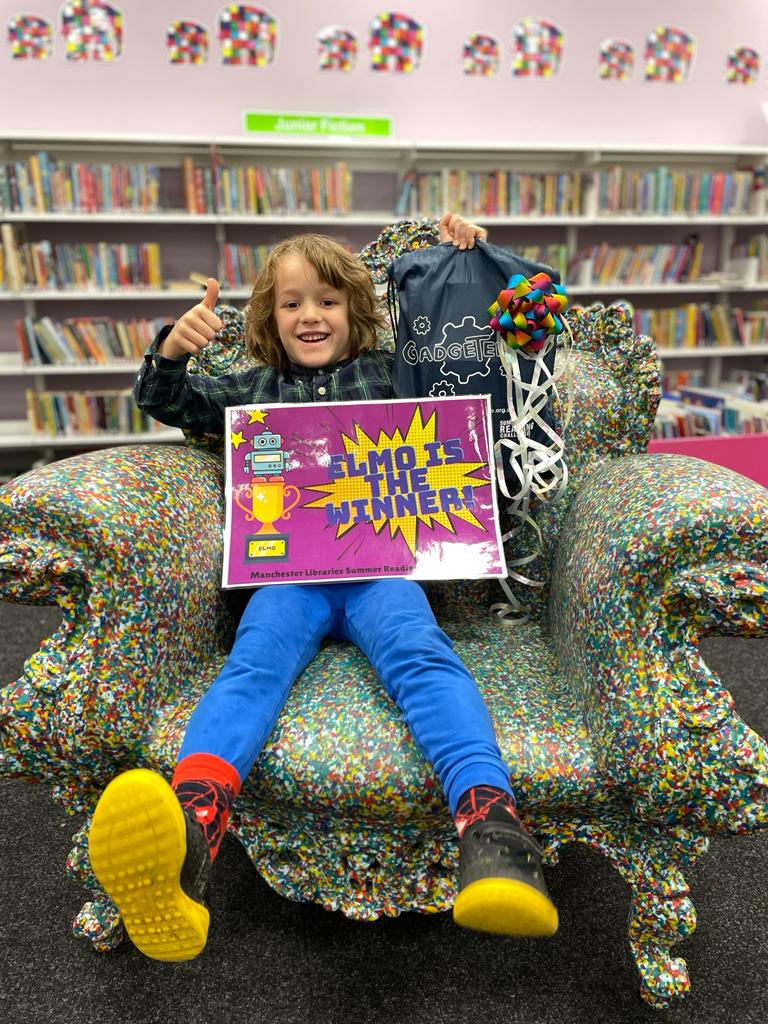 MancLibraries's tweet image. Here is the face of excitement!!! 6 year old Elmo at #HulmeLibrary is the overall win of #ManchesterLibraries #SummerReadingChallenge22. Fantastic prize of a selection of books and a £100 gift voucher! Well done Elmo :) @AnnIgbon @hacking4chorltz @Ekua4Hulme @AnnetteWright