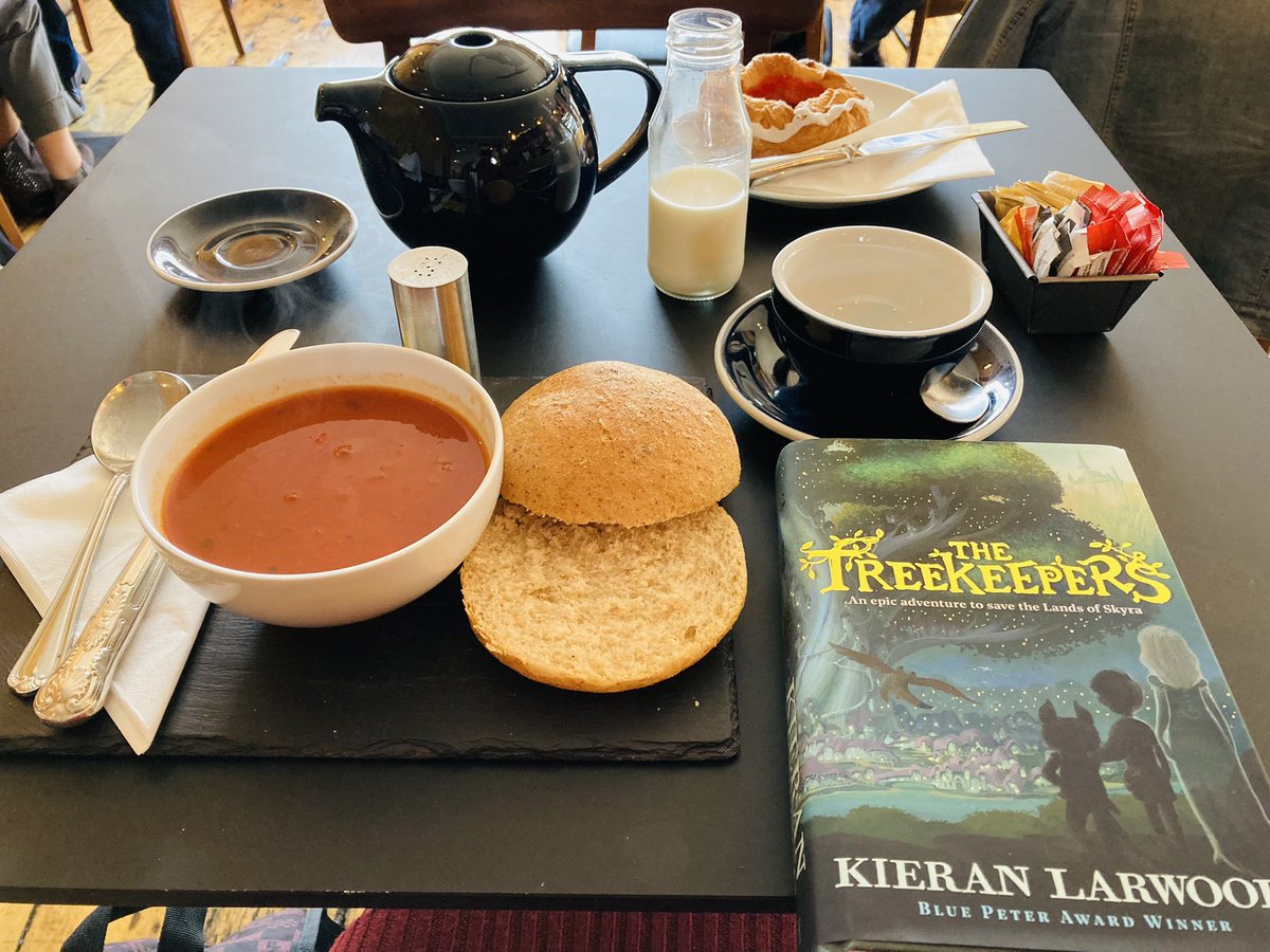 rhicook's tweet photo. At @thedanishbakery with my new copy of #TheTreekeepers by @kmlarwood enjoying a red pepper soup and jam pastry with a cuppa. Living the #HalfTerm dream! #IAmALibrarian https://t.co/vZr28l6plP