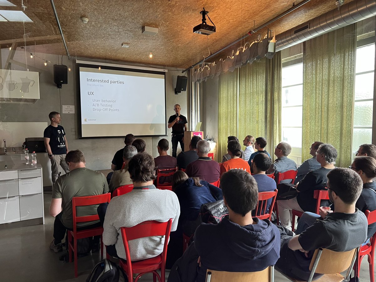 karakun's tweet photo. @madmas and Stephan Classen now talking about metrics at @Baselone. #BaselOne22 #BaselOne #Karakun #community 🫶 https://t.co/BfJoBgPEmY