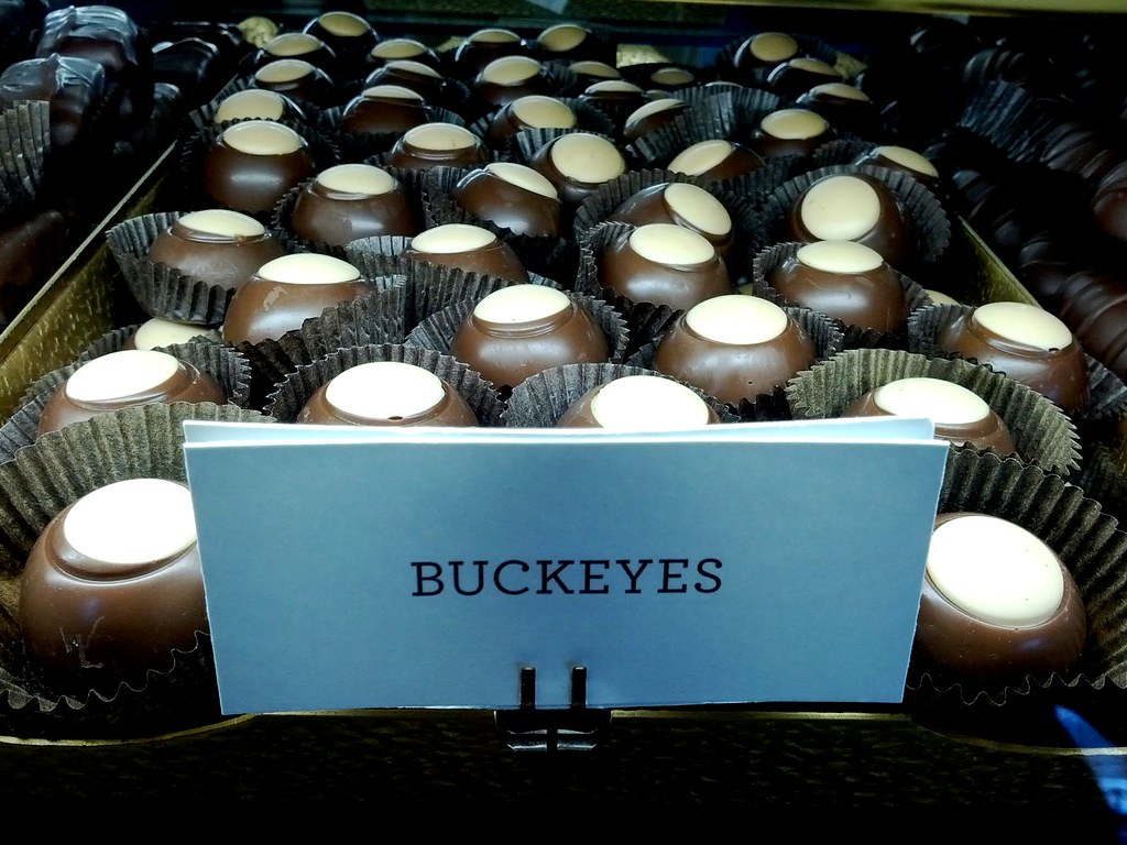 Buckeyes (Ohio) –– balls of peanut butter fudge dipped partially in chocolate to leave a small circle of peanut butter visible