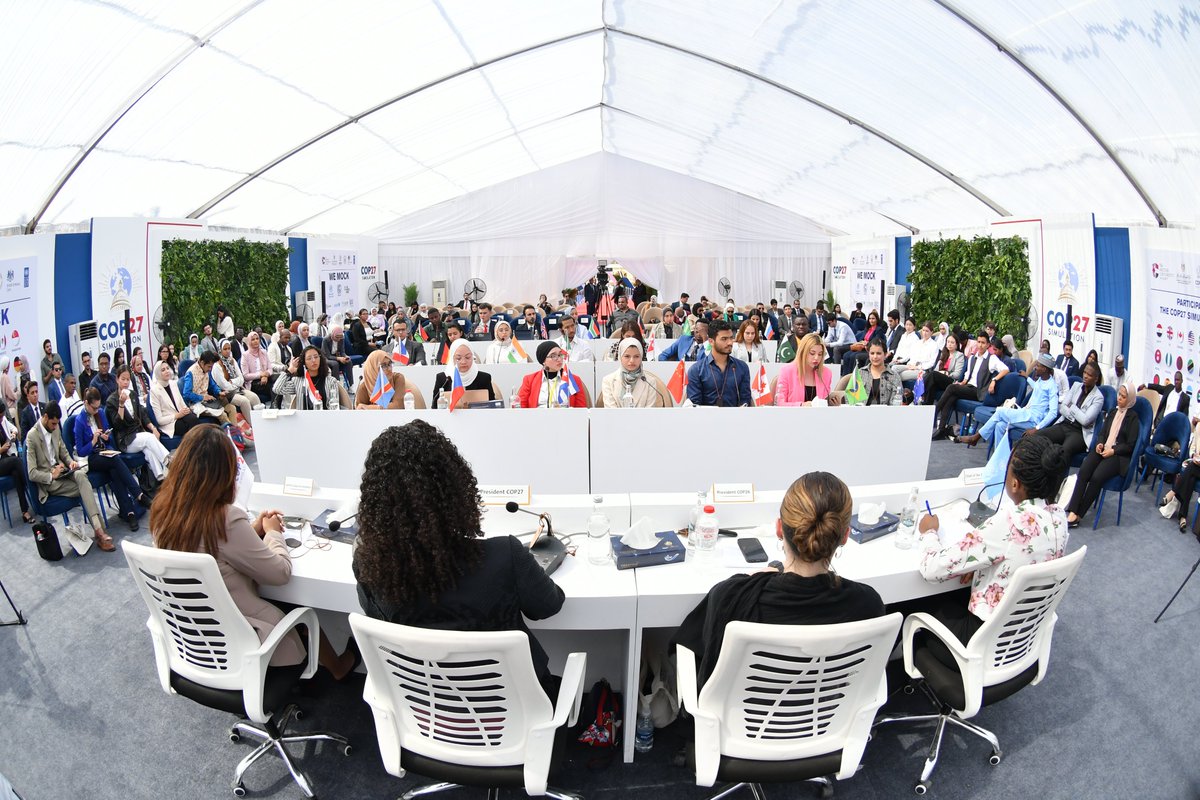 bue_official's tweet photo. Under the auspices of @EGY_YouthSports, @Mohesregypt, @UNenvoyMM, and in collaboration with @UNDPEgypt, we inaugurated the #COP27Simulation Model, engaging over 130 students from the world in #climateaction. @SarahElkhishin https://t.co/2oLODcezgs