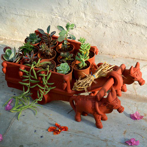 myBageecha's tweet photo. This Indian Bullock Cart would be a perfect pot stand for your lovely plants!🪴
Made out of Terracotta, this stand is suitable for both indoor and outdoor purposes. 
https://t.co/VzlMGlrNhM
#myBageecha #Wednesdayvibe #plantsonline #terracotta #pots https://t.co/wh4SAolnaB