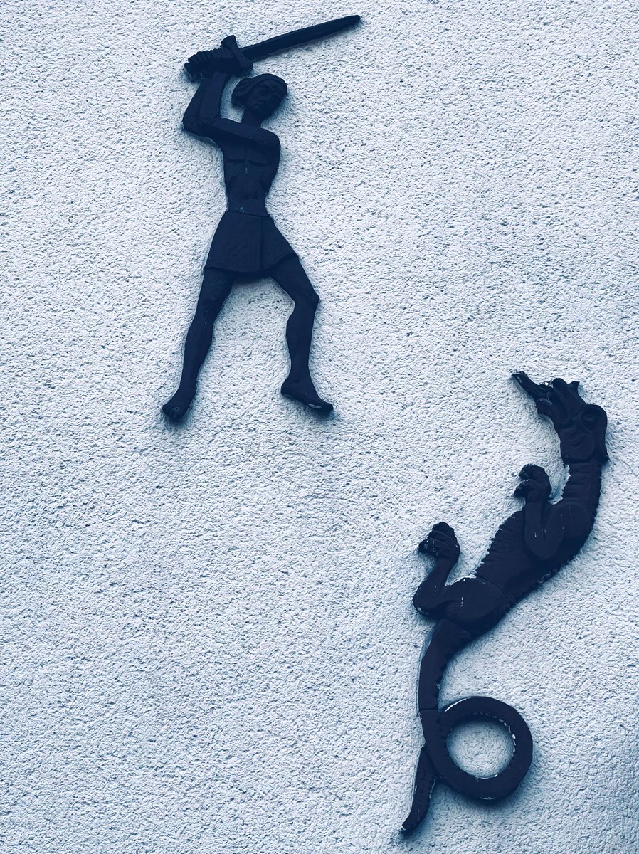 #mood Seen on a house on a morning walk. Love the fact that it appears to be a woman dragonslayer (or an early adopter of the manbun) #drachenfels #mittelrhein #wednesday