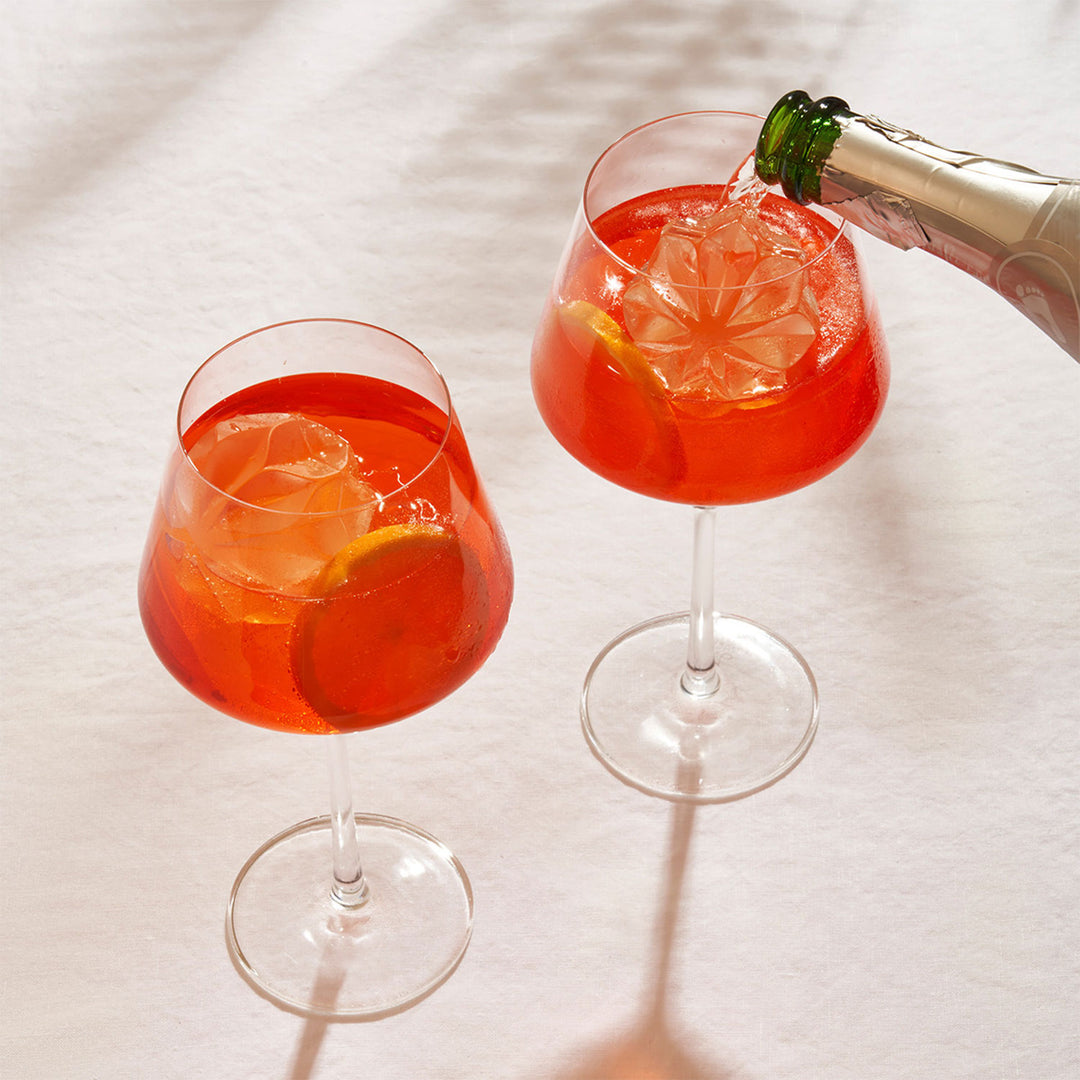 The large etched cube ice mould and the large ripple wave etched sphere ice mould.
Melts slowly for minimal dilution to chill your drink with a clean-finish taste. Made from food-grade silicone, this ice tray is BPA-free, dishwasher safe and designed to keep out freezer-flavours.