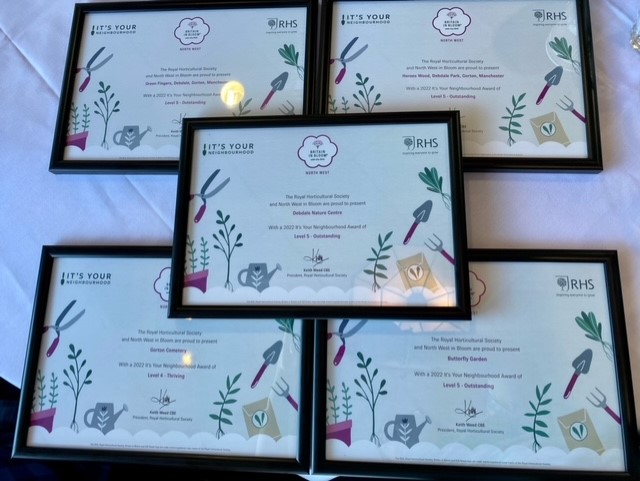 MCCGortonAHey's tweet photo. Massive well done to our community groups who attended the Britain in Bloom awards event yesterday.
Look at all those awards!!  👏🎊

Awards given to, Debdale Nature Centre, Butterfly Garden, Heroes Wood, Green Fingers Debdale 
Gorton Cemetery, to name a few..

@CllrJulieReid https://t.co/uUNDVqkoAS