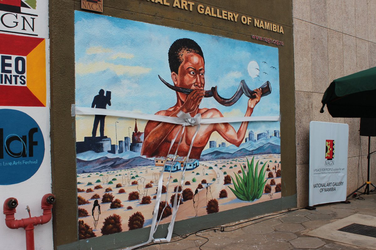 nagn_namibia's tweet photo. Let's wake up the city! Incredible craftmanship by Tity Tshilumba, NAGN as a proud partner of the OLAF festival officially unveiled this mural on Monday created as part of the festival program. #olafnamibia #otjomuiseliveartsfestival #nagnproudpartner https://t.co/urbtdtbfJL