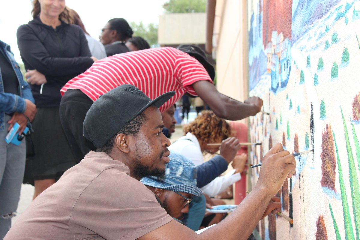 nagn_namibia's tweet photo. Let's wake up the city! Incredible craftmanship by Tity Tshilumba, NAGN as a proud partner of the OLAF festival officially unveiled this mural on Monday created as part of the festival program. #olafnamibia #otjomuiseliveartsfestival #nagnproudpartner https://t.co/urbtdtbfJL