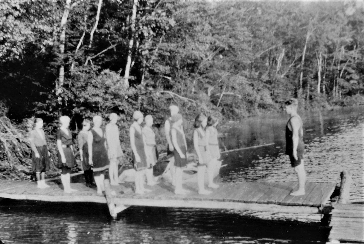 For #WaybackWednesday, we're sharing a piece of Takodah's history that we recently discovered in our archives. Inside a small envelope, hidden behind a letter in an old photo album, we found two authenticated images of the inaugural group of Girls Campers and Staff in 1922!