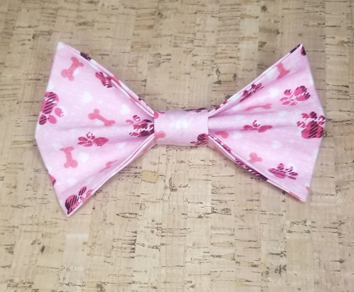 Pink paws for your puppy pal! 
#tiemyknot #petfashion #CharlotteNC
