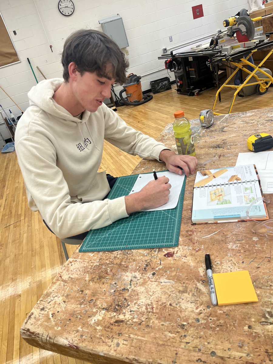 VTHSVikings's tweet photo. Mr. Matt Behre's Construction students draw up plans for projects from shelves to stools. Seniors schedule fix-it services for faculty. All are gaining real life skills, in technical ability as well as time management and accountability. #WeAreVTHS #VikingPride #VikingValues https://t.co/7i1jMusKC1