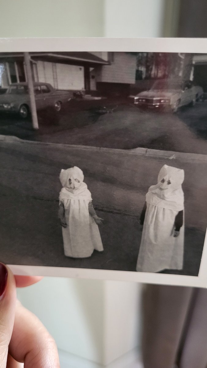 Please enjoy this picture of @DougSaunders and his brother scaring the bejesus out of Burlington. Gen X owns Halloween