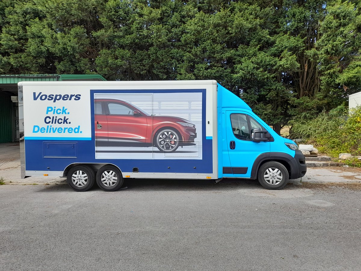 Big job to apply graphics to <a href="/VospersMotors/">Vospers</a> new vehicle delivery transport including full cab wrap!