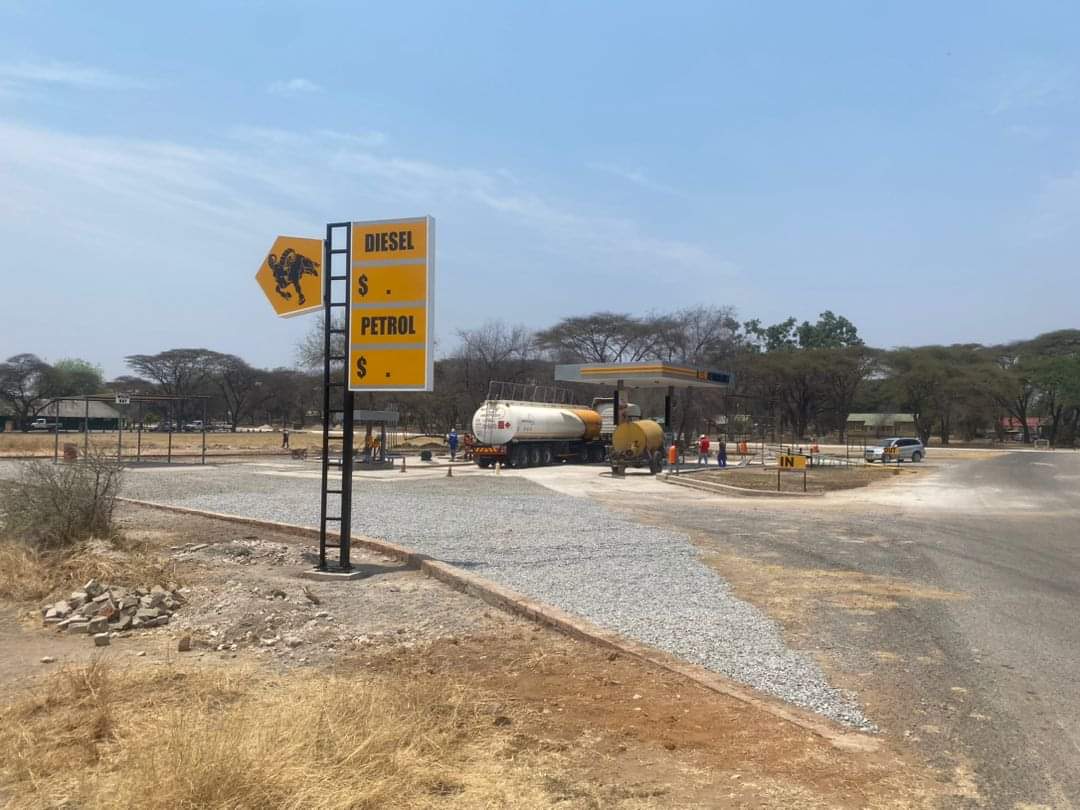 Zimparks's tweet photo. NEW DEVELOPMENT ALERT!!!
For your convenience, an exotic animal with curvy horns called Ram Petroleum is now established at Hwange Main Camp as a brand new Fuel Station! Coming soon is a Tyre puncture repair service at the new filling station.
#daretotravel 
#inharmonywithnature https://t.co/TXGwz4RS9y