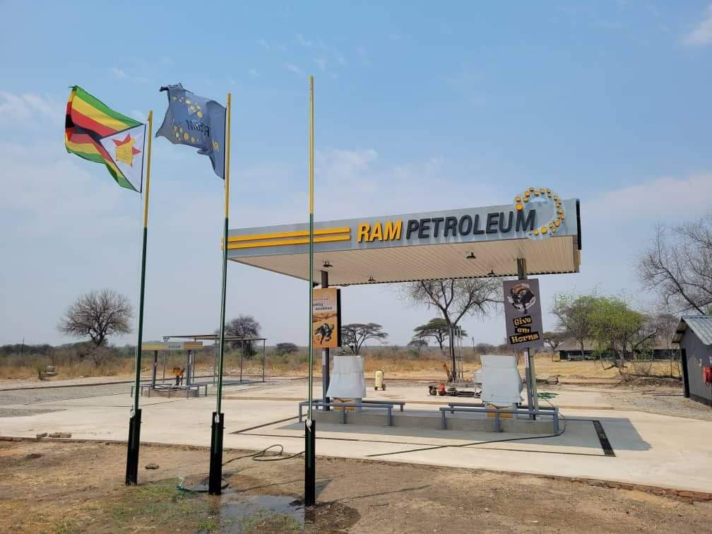 Zimparks's tweet photo. NEW DEVELOPMENT ALERT!!!
For your convenience, an exotic animal with curvy horns called Ram Petroleum is now established at Hwange Main Camp as a brand new Fuel Station! Coming soon is a Tyre puncture repair service at the new filling station.
#daretotravel 
#inharmonywithnature https://t.co/TXGwz4RS9y