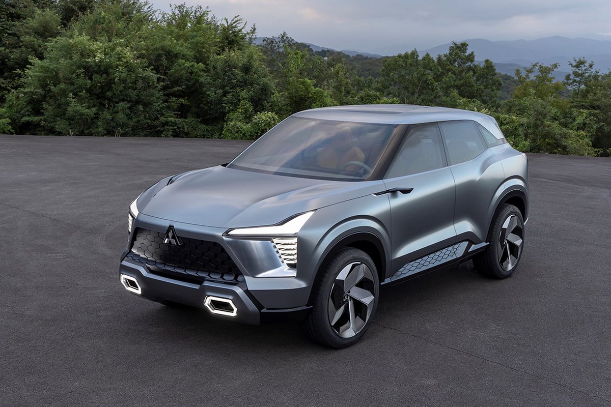cole_marzen's tweet photo. The Mitsubishi XFC Concept breaks cover with the automaker’s future design philosophy, a set of 20-inch wheels, as well as a heavily digitalized cabin. In addition, the prototype will reach production sometime later next year. #Mitsubishi #MitsubishiXFCConcept #XFCConcept #CUVs https://t.co/Wvh8O91II3
