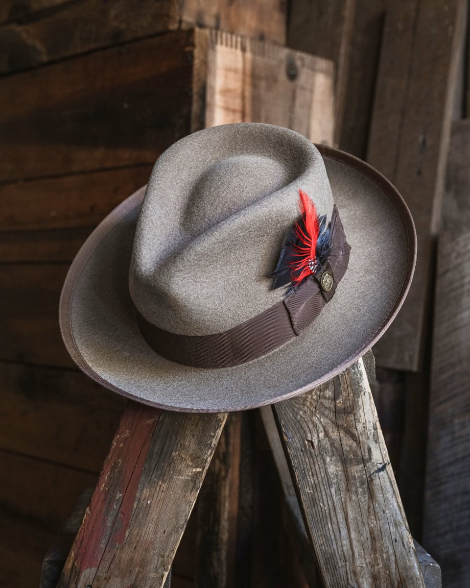 The classics never go out of style. The Whippet fedora is handcrafted with exceptional attention to detail, with a wide grosgrain band and signature feather accent. #MadeInUSA 📷 @whaleysworld