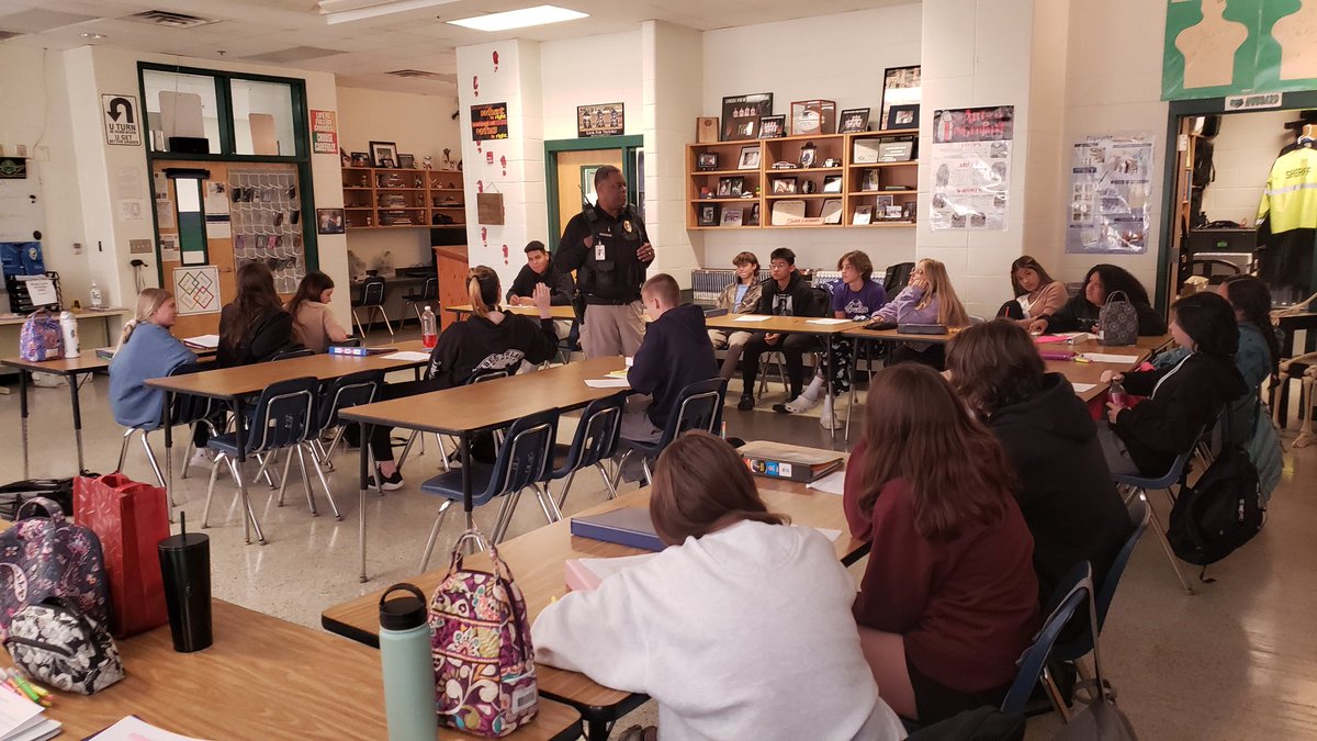 Officer Stevenson speaking about law enforcement in the intro classes.