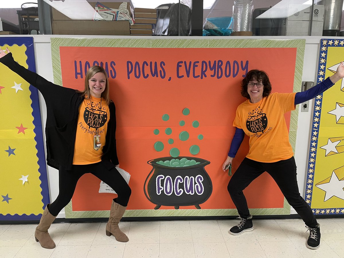 misskrollVV's tweet photo. Matching in orange for Unity Day and of course had to get a picture of our shirts that match with the bulletin board! #unityday #hocuspocuseverybodyfocus @W_Shelton5 https://t.co/0wb408xb0N